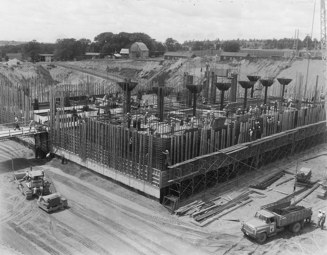 Diefenbunker under construction, showing exposed concrete pillars and rebar.